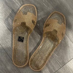 Jelly sandals- worn once. Runs narrow. Super cute with sparkles. Rose gold
